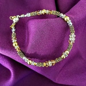 Handcrafted Magnetic closure bracelet with Swarovski crystals and antiqued beads